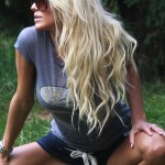 Victoria Silvstedt Stretches In A Park